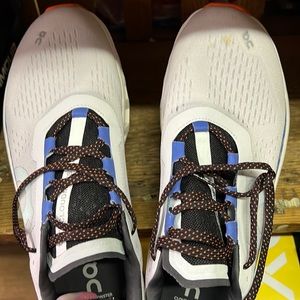 woman’s size 10 cloud monster never worn stain on right shoe